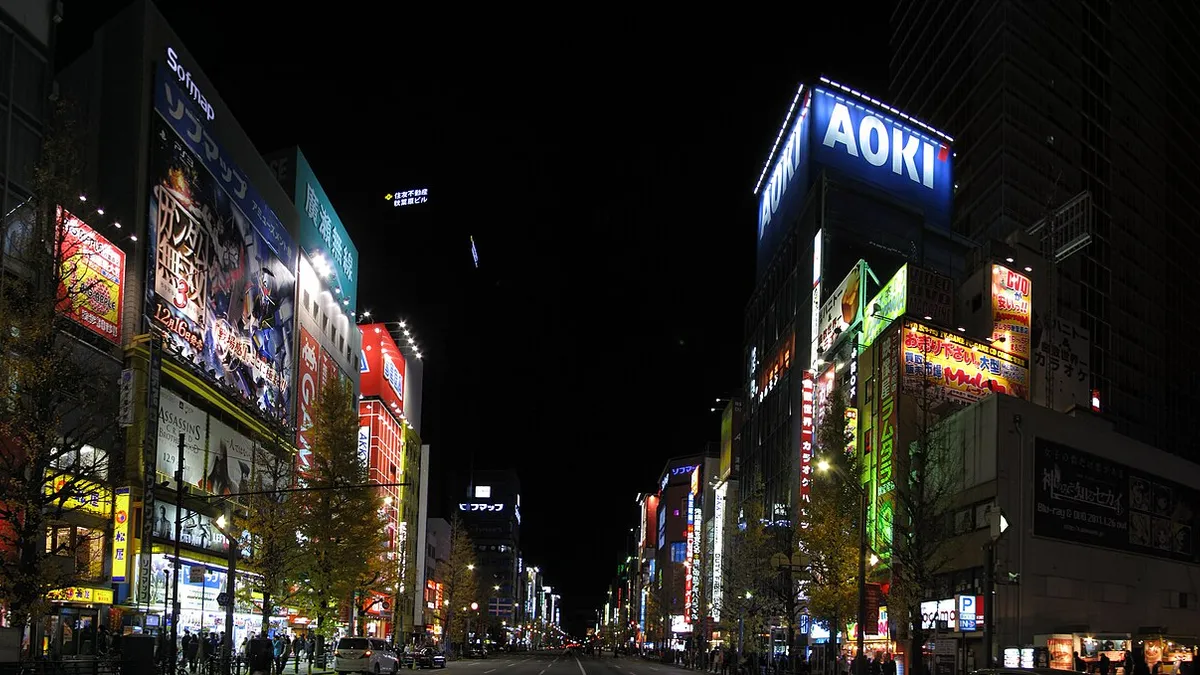 Akihabara at night in Tokyo, with lit-up billboards and shop signs along Chuo-dori