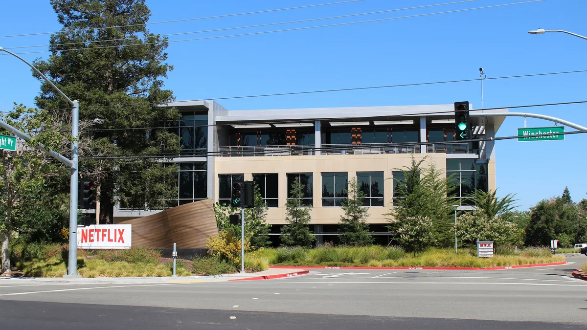 Netflix office building with the red NETFLIX sign in Los Gatos, California