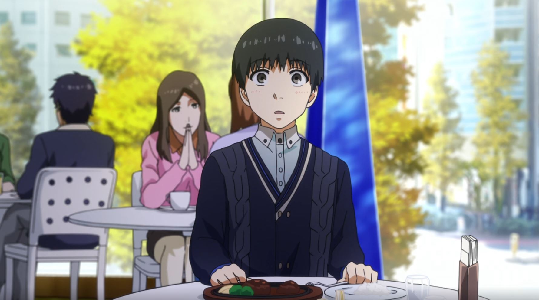 Ken Kaneki sitting at a café table in a scene from Studio Pierrot's Tokyo Ghoul
