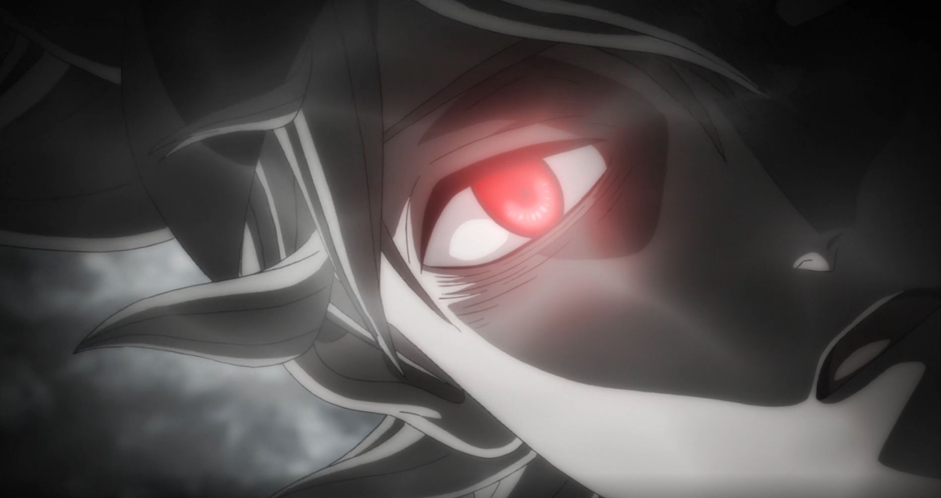 Close-up of Asta's glowing red eye in a dark, near-monochrome scene from the Black Clover anime