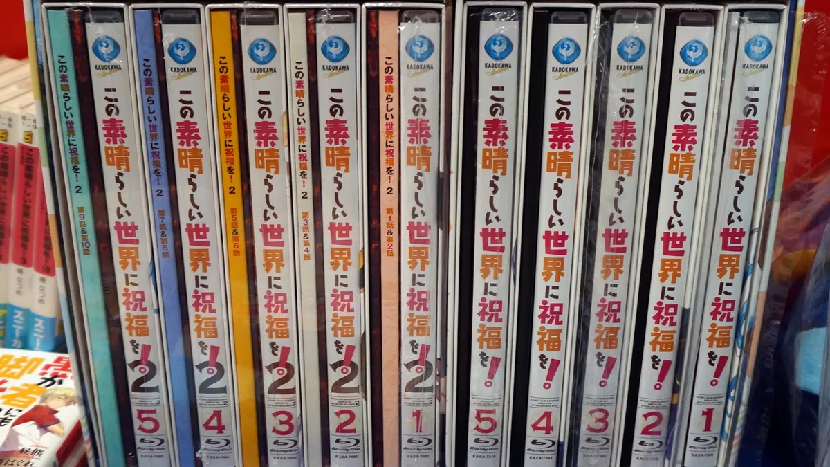 A KonoSuba anime Blu-ray box set with ten discs on display at a store